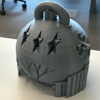grey 3d printed ornament with star cut outs