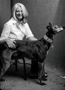 Close-up of Bonnie Garmus with her dog, 99